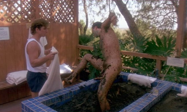 Tim Robbins climbs from a mud bath in The Player